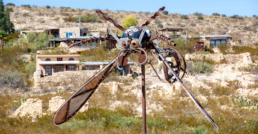 Metal insect sculpture.